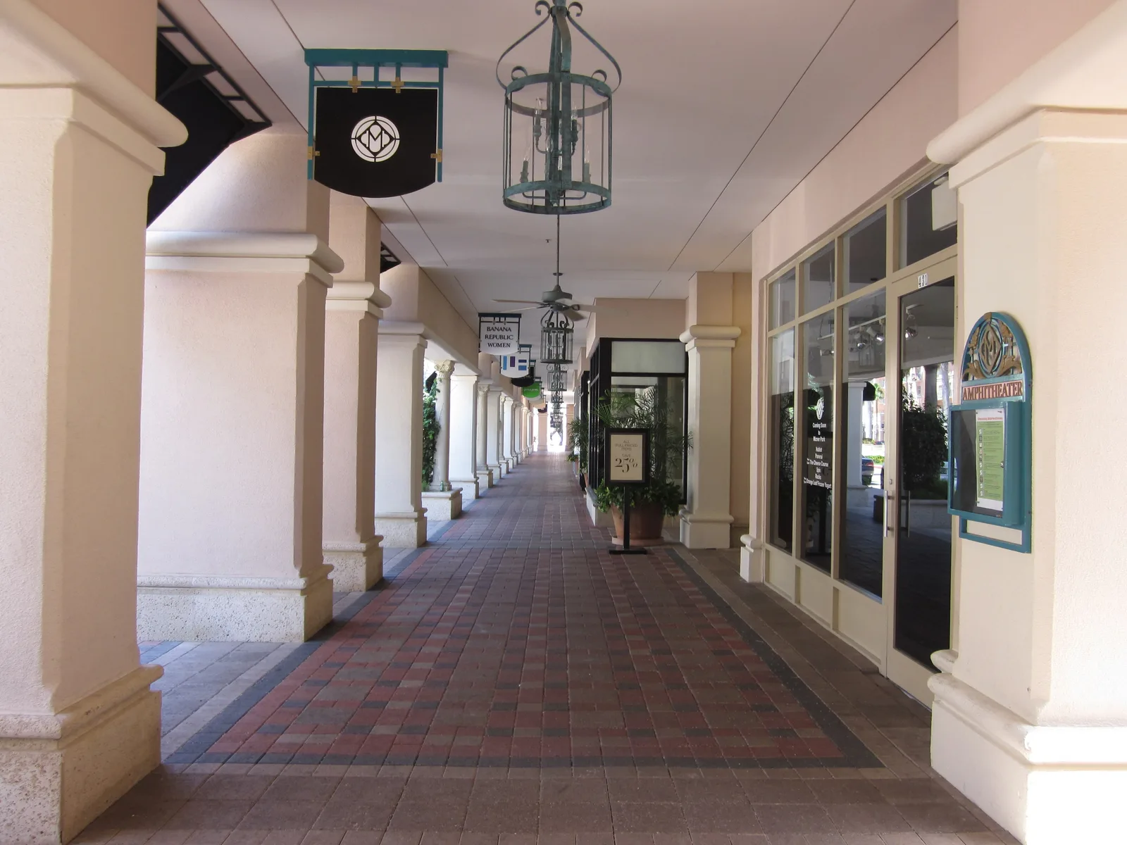 The shaded arcade along the storefronts of Mizner Park in downtown Boca Raton.