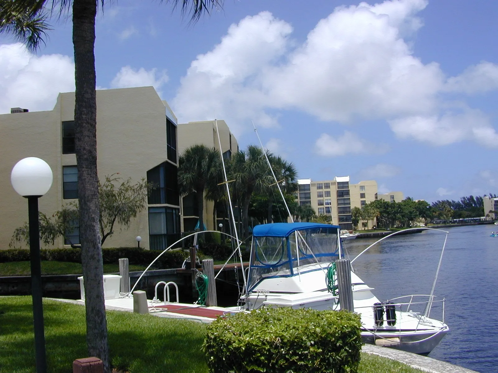 Condominiums and a boat dock on the water at the Boca Bayou complex in Boca Raton.