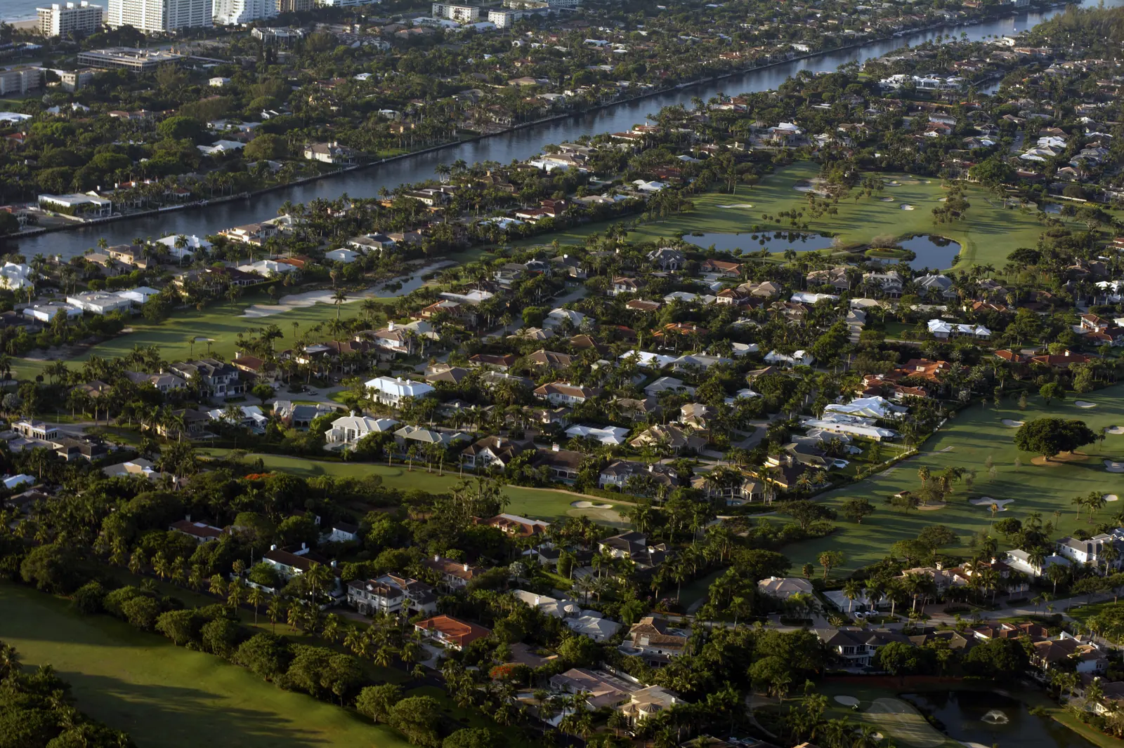 Homes, canals and the golf course of the Royal Palm Yacht Club in Boca Raton, seen from the air